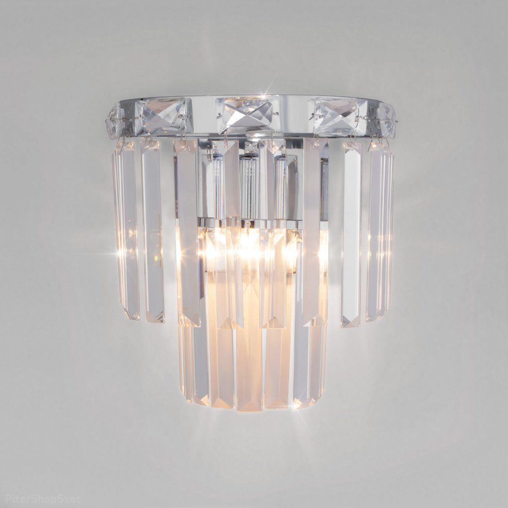 Хромированный настенный светильник с хрустальными подвесками «Elegante» 10130/1 хром/прозрачный хрусталь Strotskis